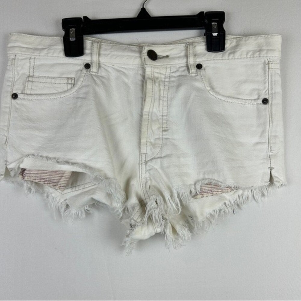 We the free button fly raw hem jean shorts beige size 27